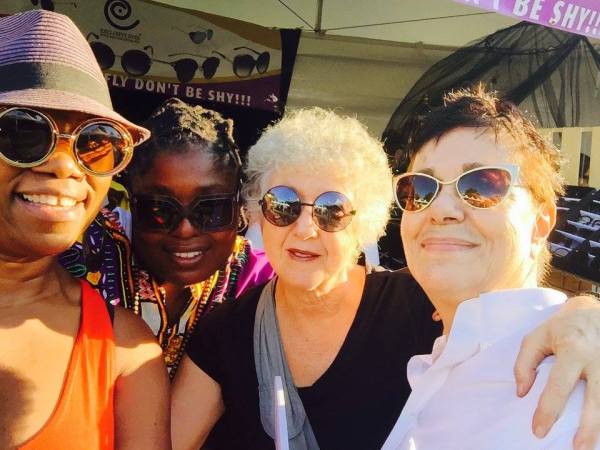 Shopping for sunglasses at Afropunk. Deb Mitchell, Diamond (Exclusives Eyewear), Marian Rivman, Ruth LaFerla.