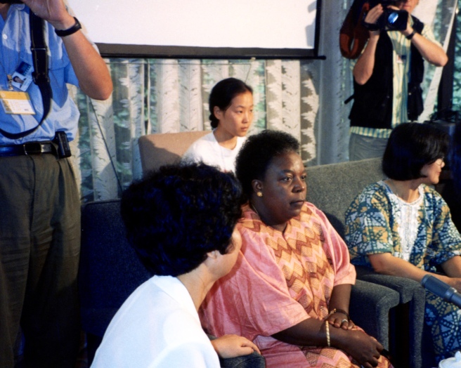 Beijing 1995 - Center: Gertrude Mongella, Secretary General of the Fourth World Conference on Women, at a press conference in Huairao